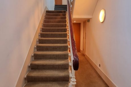 Staircase in the 3 Bedroom Grand Plaza Suite at Grand Plaza Hotel London.