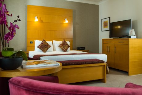 Grand Deluxe Double room with modern amenities and elegant decor. Close to Hyde Park, perfect for a luxurious stay.