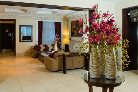 Lobby area of one of the best hotels in London. Elegant decor, comfortable seating, and a welcoming atmosphere.