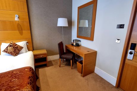 Desk room at Park Grand Hotel Kensington. A spacious and well-equipped workspace with a comfortable desk and chair.